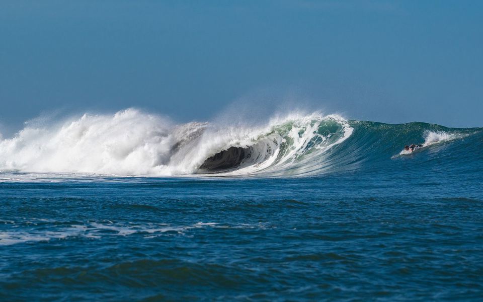 A hollow wave breaking over the reef at Popoyo, Nicaragua.